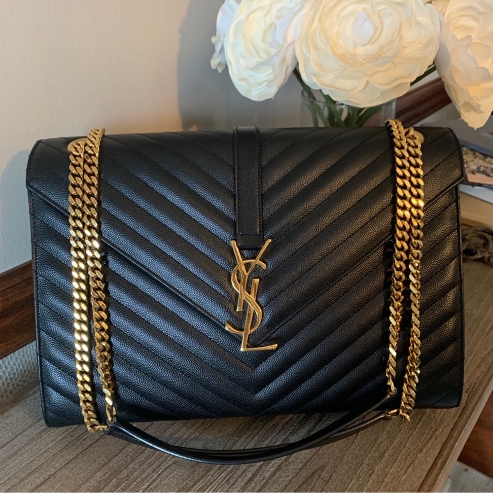 Saint Laurent Black Shoulder Bag with Gold Hardware and Quilted Leather